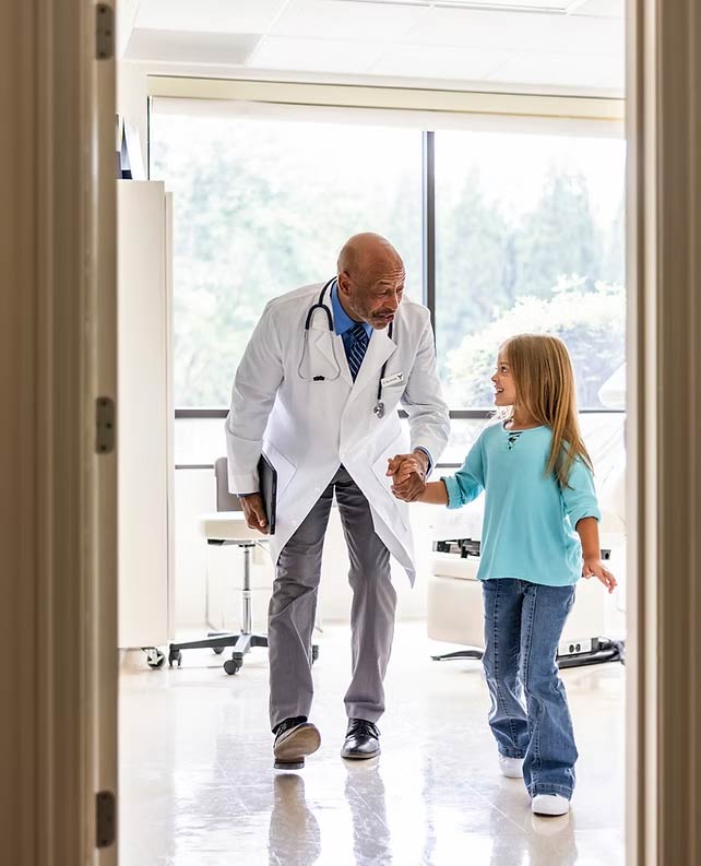 Doctor With Little Girl